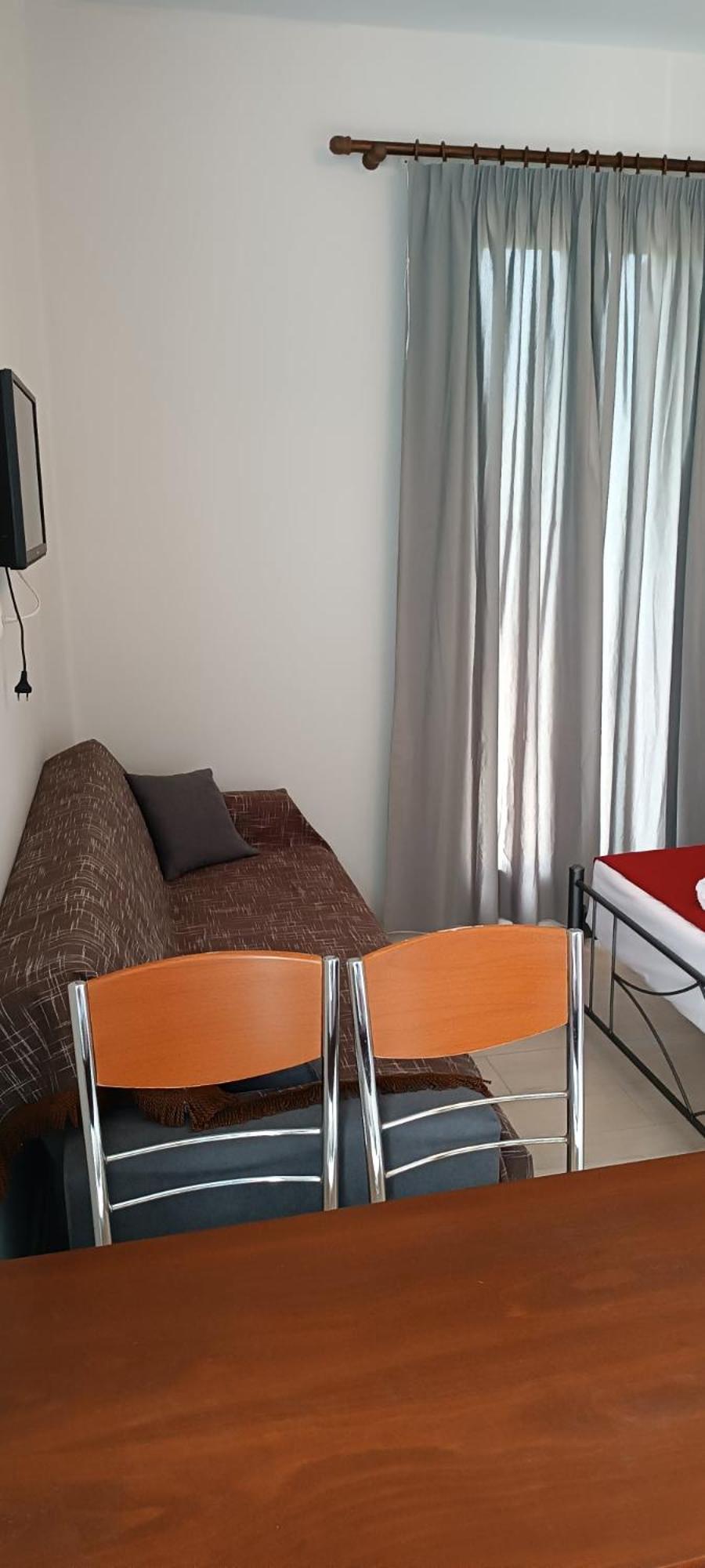Andros Guesthouses Стая снимка